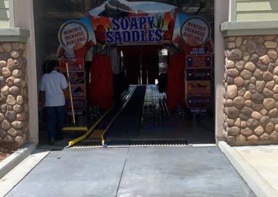 Soapy Saddles Car Wash entrance tunnel